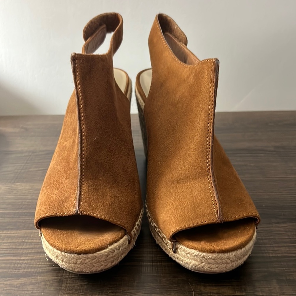 Brown open toed wedges size 9.5 with velcro strap in the back
